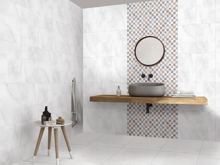 White bathroom design with round mirror, shelf, table  and a grey sink